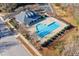 Community pool with a pool house and surrounding landscaping at 3921 Robins Nest Ln, Wake Forest, NC 27587