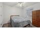 Bedroom with double bed, ceiling fan, and wood dresser at 411 Joneshaven Dr, Fuquay Varina, NC 27526