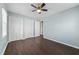 Bright bedroom with double closets and ceiling fan at 4816 Connell Dr, Raleigh, NC 27612