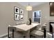 Cozy dining room with stylish furniture and a bright window offering natural light at 512-A E Graham St, Mebane, NC 27302