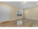 Spacious entryway with hardwood floors and a door leading outside at 512-A E Graham St, Mebane, NC 27302