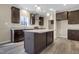 Gourmet kitchen with granite countertops, stainless steel appliances, and a center island at 512-A E Graham St, Mebane, NC 27302