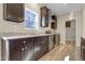 Kitchen featuring granite countertops, stainless steel appliances, and modern fixtures at 512-A E Graham St, Mebane, NC 27302