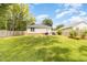 Spacious backyard with patio and garden at 619 Barbour St, Clayton, NC 27520