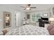 Bright bedroom with wood bed frame and built-in desk at 619 Barbour St, Clayton, NC 27520