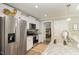 Modern kitchen with stainless steel appliances and granite countertops at 619 Barbour St, Clayton, NC 27520