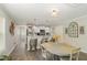 Modern kitchen with white cabinets and a breakfast bar at 619 Barbour St, Clayton, NC 27520