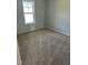 Bedroom with neutral carpet and natural light at 69 N Movado Trl, Kenly, NC 27542
