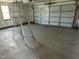 Spacious two-car garage with ample room for parking and storage at 69 N Movado Trl, Kenly, NC 27542