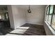 Formal dining area featuring hardwood floors and large windows at 75 Leisure Ln, Louisburg, NC 27549