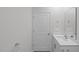 Double vanity bathroom with a door to another room at 7565 Michelle Rd, Rocky Mount, NC 27803