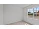 Bright bedroom with large window and neutral wall colors at 7565 Michelle Rd, Rocky Mount, NC 27803