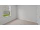 Small bedroom featuring a window and neutral tones at 7565 Michelle Rd, Rocky Mount, NC 27803
