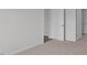 Simple bedroom with neutral walls and carpeted floors at 7565 Michelle Rd, Rocky Mount, NC 27803