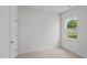 Simple bedroom with a window and neutral decor at 7565 Michelle Rd, Rocky Mount, NC 27803