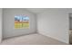 Bright bedroom with neutral walls and carpeted floors at 7565 Michelle Rd, Rocky Mount, NC 27803