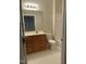 Traditional bathroom featuring a vanity sink and tiled bath with shower combo at 814 Providence Glen Dr, Chapel Hill, NC 27514