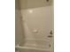 Tiled shower and bath featuring a shower head and a soap dish at 814 Providence Glen Dr, Chapel Hill, NC 27514