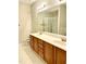 Bathroom with double sink vanity and a large mirror at 814 Providence Glen Dr, Chapel Hill, NC 27514