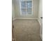 Bright bedroom featuring carpeted floors, natural light, and neutral walls at 814 Providence Glen Dr, Chapel Hill, NC 27514