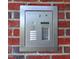 Close-up of the building's modern secure entry system on brick wall at 814 Providence Glen Dr, Chapel Hill, NC 27514