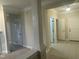 Hallway features neutral colors and tile flooring at 814 Providence Glen Dr, Chapel Hill, NC 27514