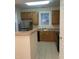 Functional kitchen features wood cabinets, neutral countertops, and stainless steel appliances at 814 Providence Glen Dr, Chapel Hill, NC 27514