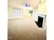 A comfortable living room with a fireplace and an open layout at 814 Providence Glen Dr, Chapel Hill, NC 27514