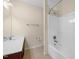 Main bathroom with tub, shower, and double vanity at 8352 Primanti Blvd, Raleigh, NC 27612