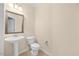 Clean bathroom with pedestal sink and toilet at 8352 Primanti Blvd, Raleigh, NC 27612