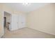 Bedroom with double doors leading to the hallway at 8352 Primanti Blvd, Raleigh, NC 27612