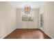 Bright breakfast nook with hardwood floors and window at 8352 Primanti Blvd, Raleigh, NC 27612