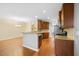 Open kitchen with granite countertops and stainless steel appliances at 8352 Primanti Blvd, Raleigh, NC 27612