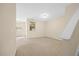 Living room with carpeted floors and neutral walls at 8352 Primanti Blvd, Raleigh, NC 27612