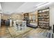 Spacious basement with dining area, treadmill, and shelving at 8437 Charlie Stovall Rd, Oxford, NC 27565