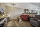 Finished basement with comfortable seating area and wood floors at 8437 Charlie Stovall Rd, Oxford, NC 27565