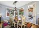 Bright dining room with access to screened porch at 8437 Charlie Stovall Rd, Oxford, NC 27565