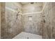 Large walk-in shower with tiled walls and pebble floor at 8437 Charlie Stovall Rd, Oxford, NC 27565