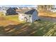 Two-story house on a large lot with a landscaped yard at 88 Tennyson Dr, Garner, NC 27529