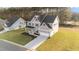 Two-story house on a large lot with a landscaped yard at 88 Tennyson Dr, Garner, NC 27529