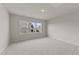 Bright bedroom with carpet flooring and large window offering natural light at 88 Tennyson Dr, Garner, NC 27529
