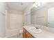 Clean bathroom with a bathtub, sink, and vanity at 9104 Colony Village Ln, Raleigh, NC 27617