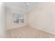 Bedroom with ceiling fan, window blinds, and neutral carpeting at 9104 Colony Village Ln, Raleigh, NC 27617