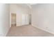 Bedroom with ceiling fan, double closets and adjacent bathroom at 9104 Colony Village Ln, Raleigh, NC 27617