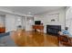 Living room featuring hardwood floors and access to other rooms at 921 Washington St # 101, Raleigh, NC 27605