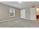 Spacious bedroom with double doors and access to bathroom at 924 Bentbury Way, Cary, NC 27518