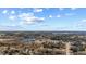 Wide shot of houses, trees, and a lake in the distance at 1007 N King Ave, Dunn, NC 28334