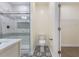 Updated bathroom with walk-in shower, toilet, and stylish tile floor at 1007 N King Ave, Dunn, NC 28334