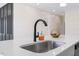 Modern kitchen sink and faucet with quartz countertop at 1007 N King Ave, Dunn, NC 28334
