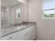 Bathroom with granite countertop vanity and shower at 103 Scoville St, Oxford, NC 27565